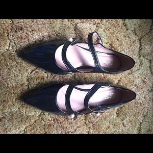 Never worn black patent flats. Size 7